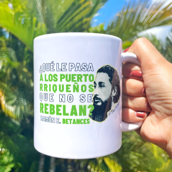 Taza con frase y foto del Padre de la Patria Puertorriqueña, Ramón Emeterio Betances y Alacán, llamando a Puerto Rico a la rebelión: "No quiero la colonia con España ni con Estados Unidos. ¿Qué le pasa a los puertorriqueños que no se rebelan?" Cofee mug with photo and quote from Betances, Puerto Rican revolutionary.